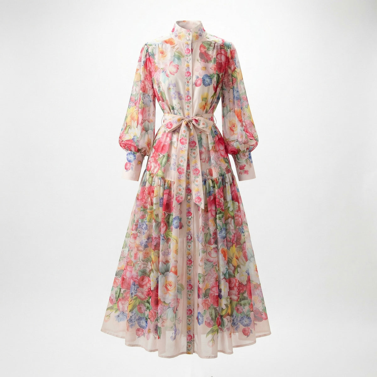 Full length view of the Abdulla floral maxi dress in pink and multicolor chiffon featuring lantern sleeves and a waist tie.
