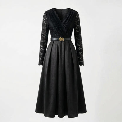 Adelmira midi-maxi dress in brown and black featuring a floral lace long-sleeve bodice, pleated skirt, and gold buckle belt.
