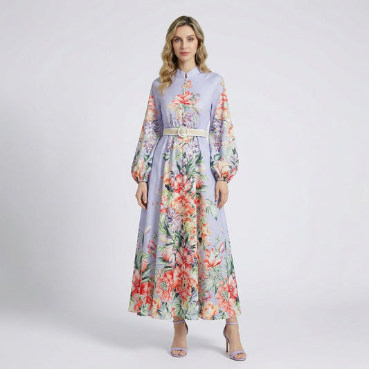 Front view of Annie floral print maxi dress in lavender and white colors with lantern sleeves and waist belt.