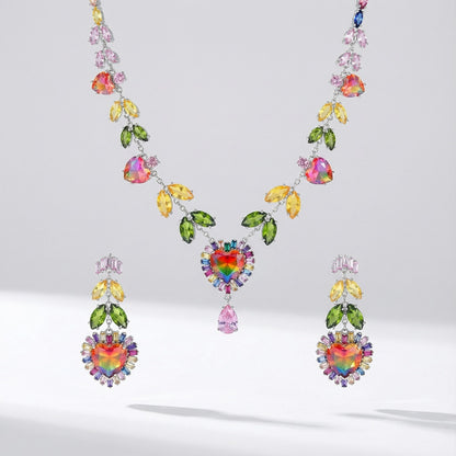 olorful rhinestone necklace and earrings set with green yellow and pink cubic zirconia and heart details