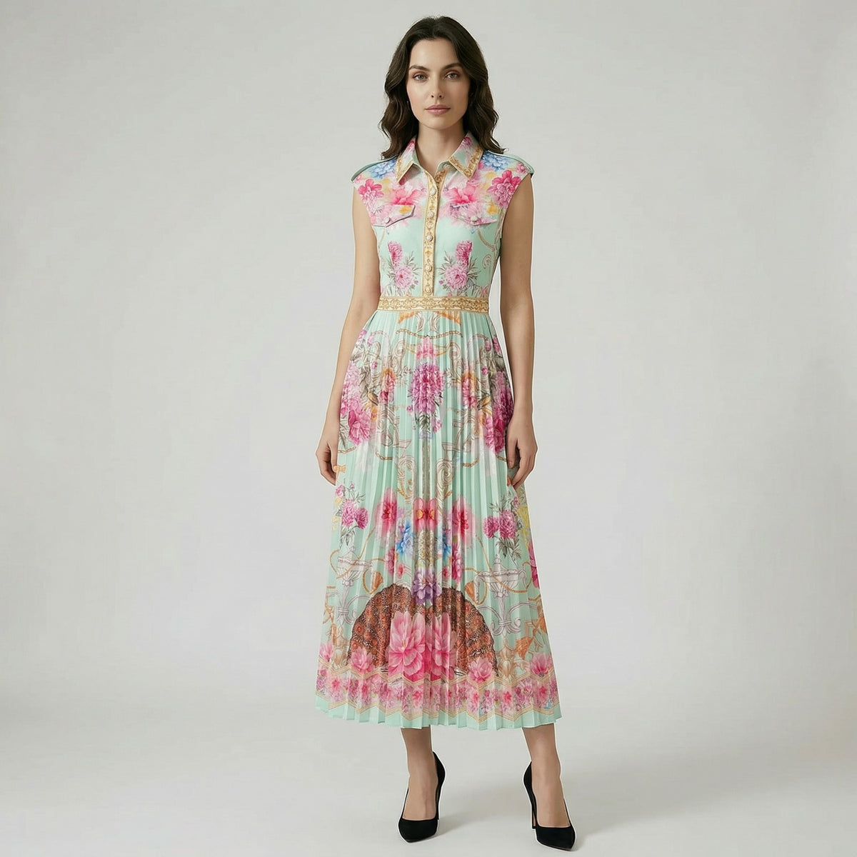 Elisabeth sleeveless maxi dress in black and gold baroque print with pleated skirt.