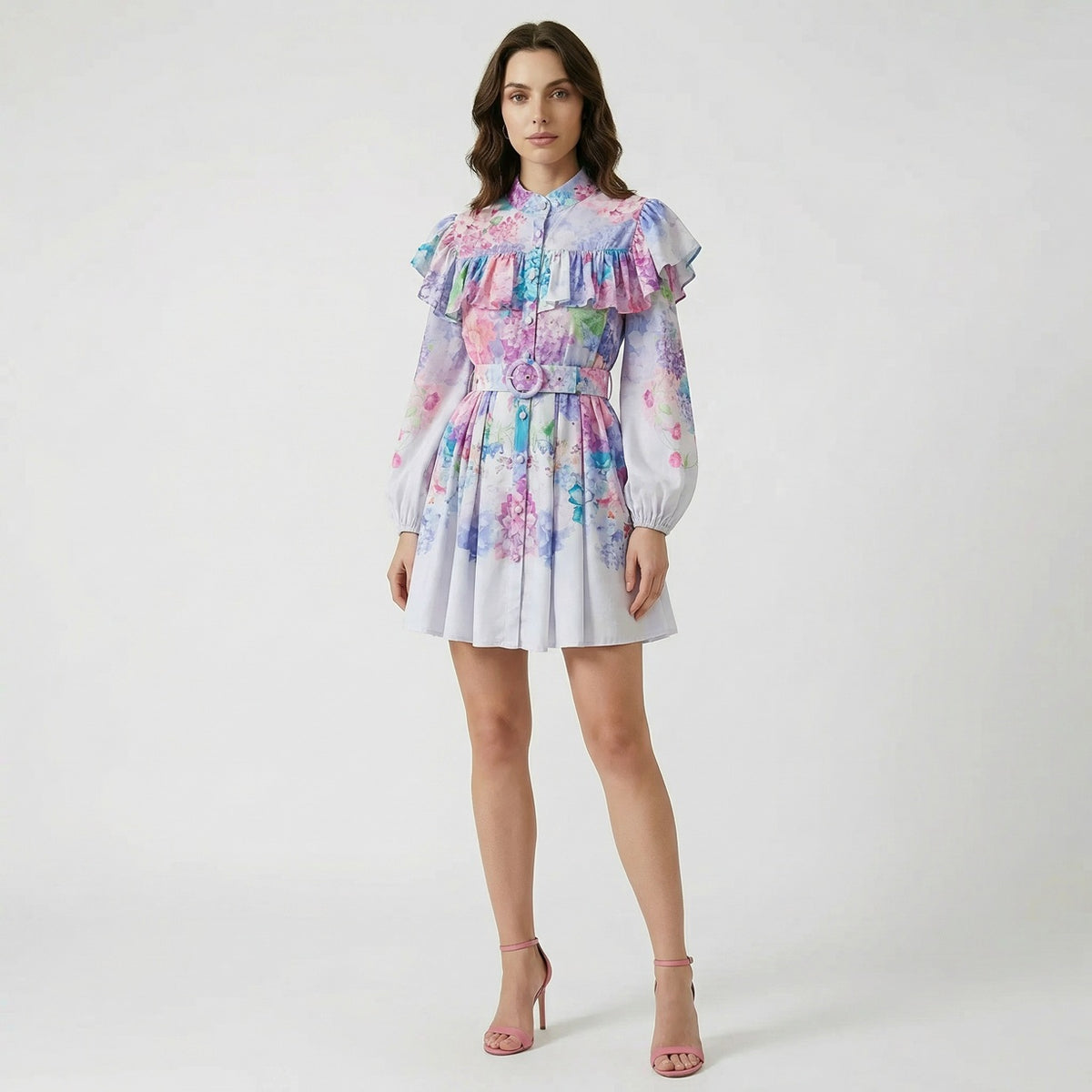 Front view of Giulia mini dress in purple hydrangea floral print with ruffle chest detail, high neck, and fabric belt.