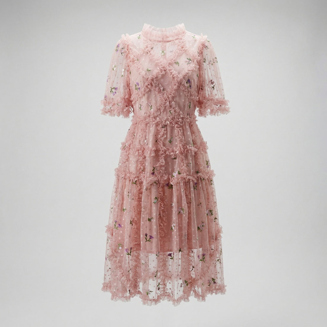 Front view of Graciane pink mini dress with floral embroidery and tiered ruffles