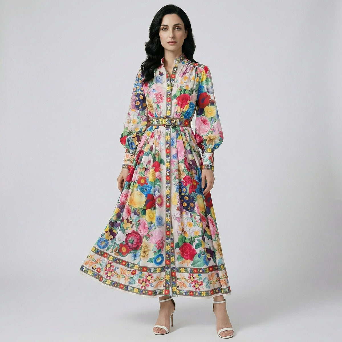 Full-length view of the Jennifer floral print maxi dress in teal and cream with lantern sleeves and matching waist belt.