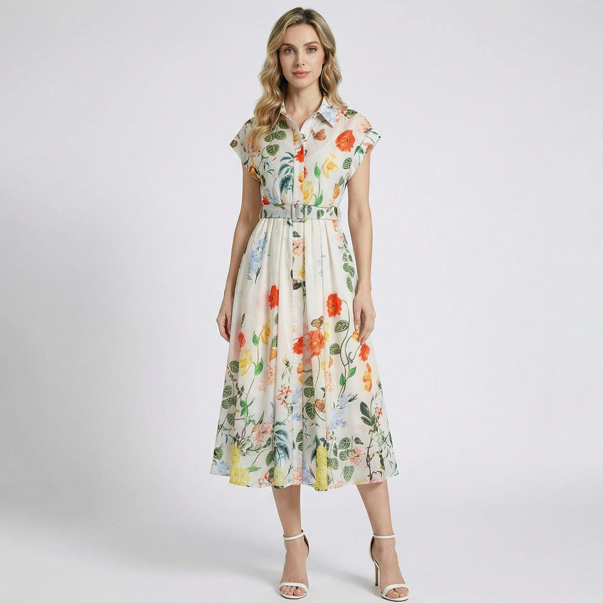 Julie vintage-inspired shirt dress in cream with a yellow and green botanical print and button-front detail.