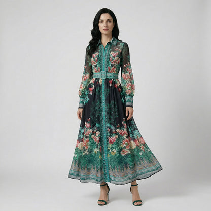 Woman wearing the Lea Maxi Dress, a 140cm (55 inch) floor-length flowy gown in black.