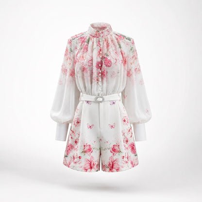 airy and delicate sheer pink chiffon blouse from the Linda Set, showcasing covered front loop buttons and a soft watercolor butterfly and floral pattern.