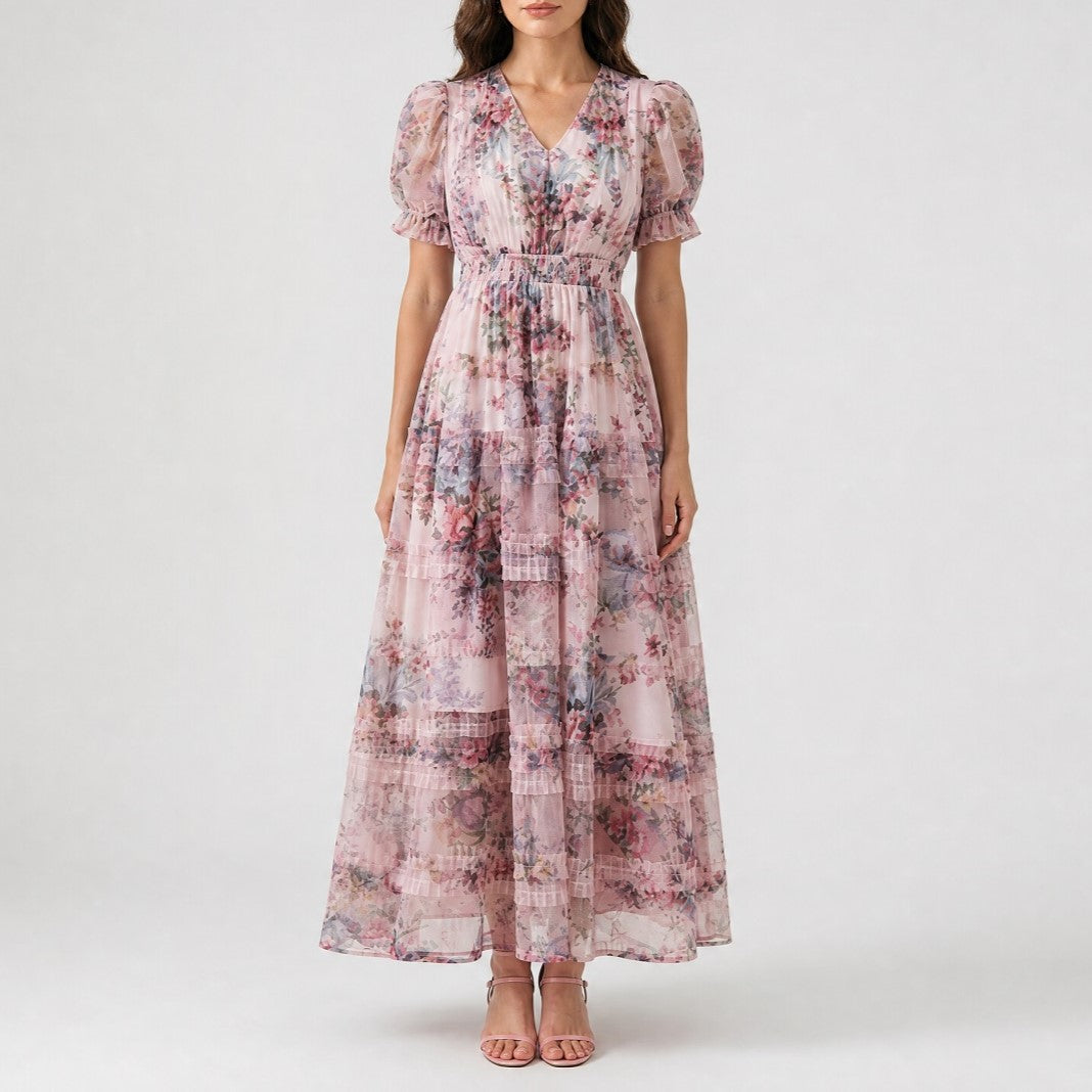Luca floral pink maxi dress with puff sleeves, V-neck, empire waist and flowy tiered skirt for spring and summer.