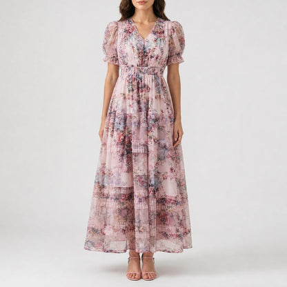 Luca floral pink maxi dress with puff sleeves, V-neck, empire waist and flowy tiered skirt for spring and summer.