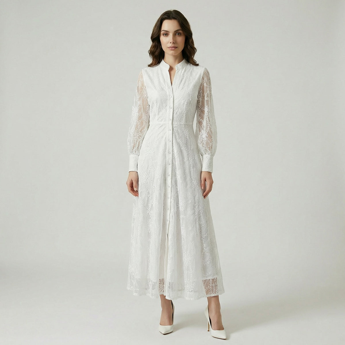 Manar 135cm maxi dress in black, blue, and white featuring floral embroidery and lantern sleeves.