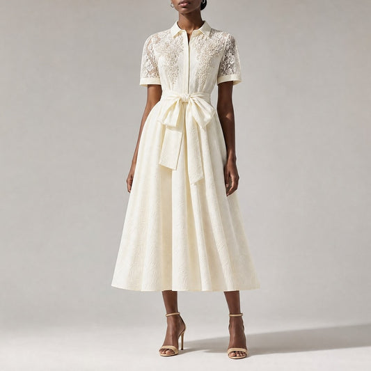 Marta dress bodice, highlighting the detailed floral lace overlays, sheer mesh collar, and dense clusters of hand-placed white faux pearls.pearl-beaded vintage dress in classic black, featuring short mesh lace sleeves and a statement wrap-around waist bow.pearl-embroidered mesh lace dress in beige, featuring a large waist bow, tailored collar, and matching vintage accessories.vintage A-line midi dress in beige, showing the sheer mesh paisley lace back yoke and a defined tie-waist band.