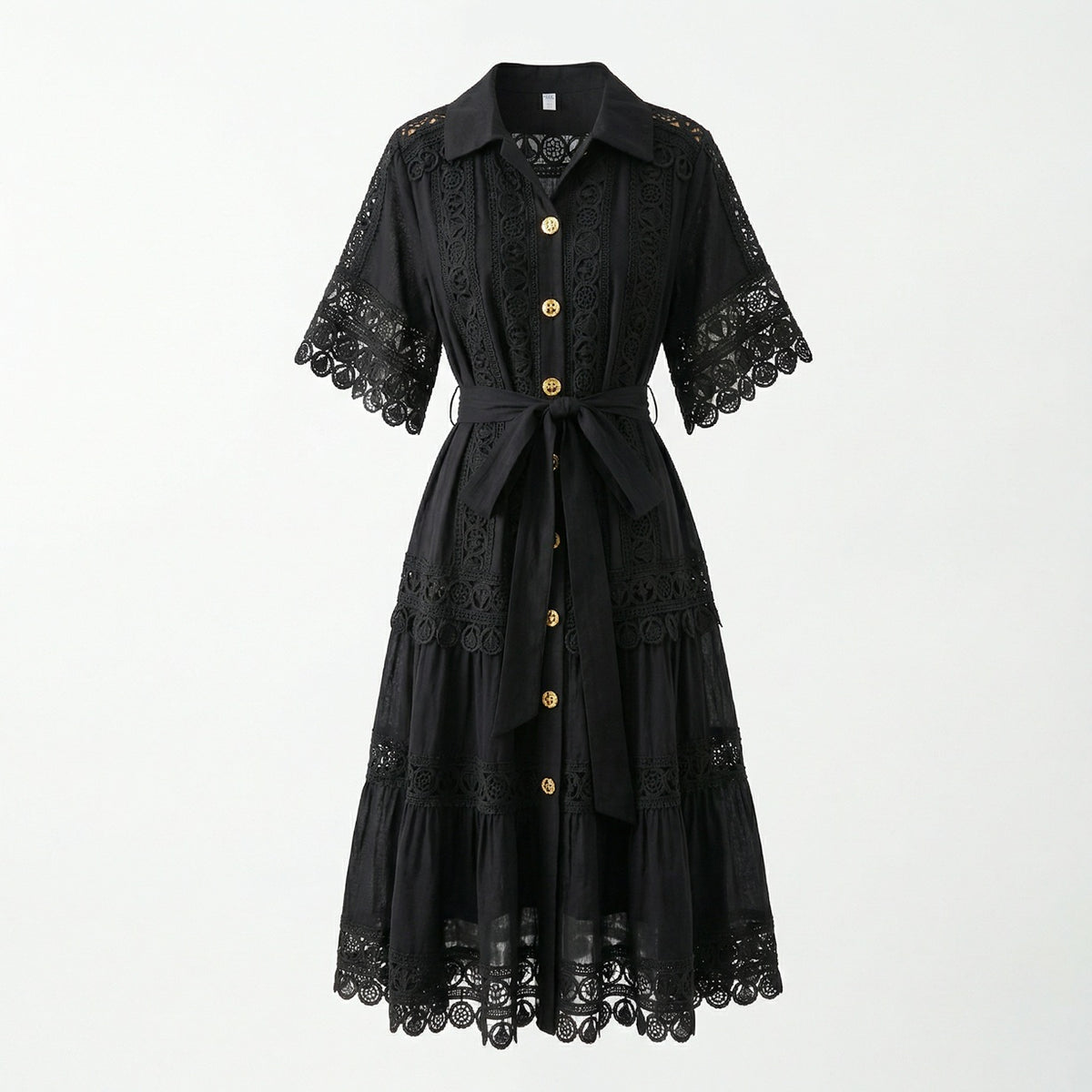 The Noora midi dress shown in black, white, sage green, and camel featuring intricate lace panels, gold buttons, and a matching belt.