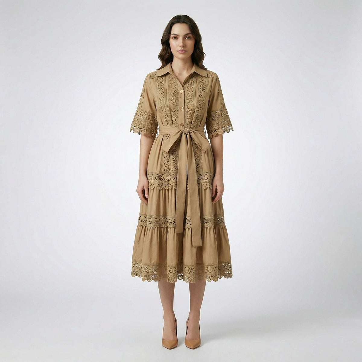 The Noora midi dress shown in black, white, sage green, and camel featuring intricate lace panels, gold buttons, and a matching belt.