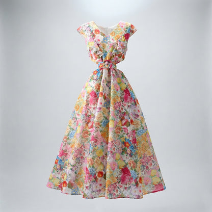 Full length view of the Seraphina multi-colored floral maxi dress with ruffles and a matching waist belt.