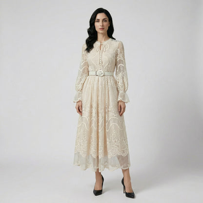 A woman wearing the Shelley midi dress, featuring a 125 cm length and elegant tailored fit.