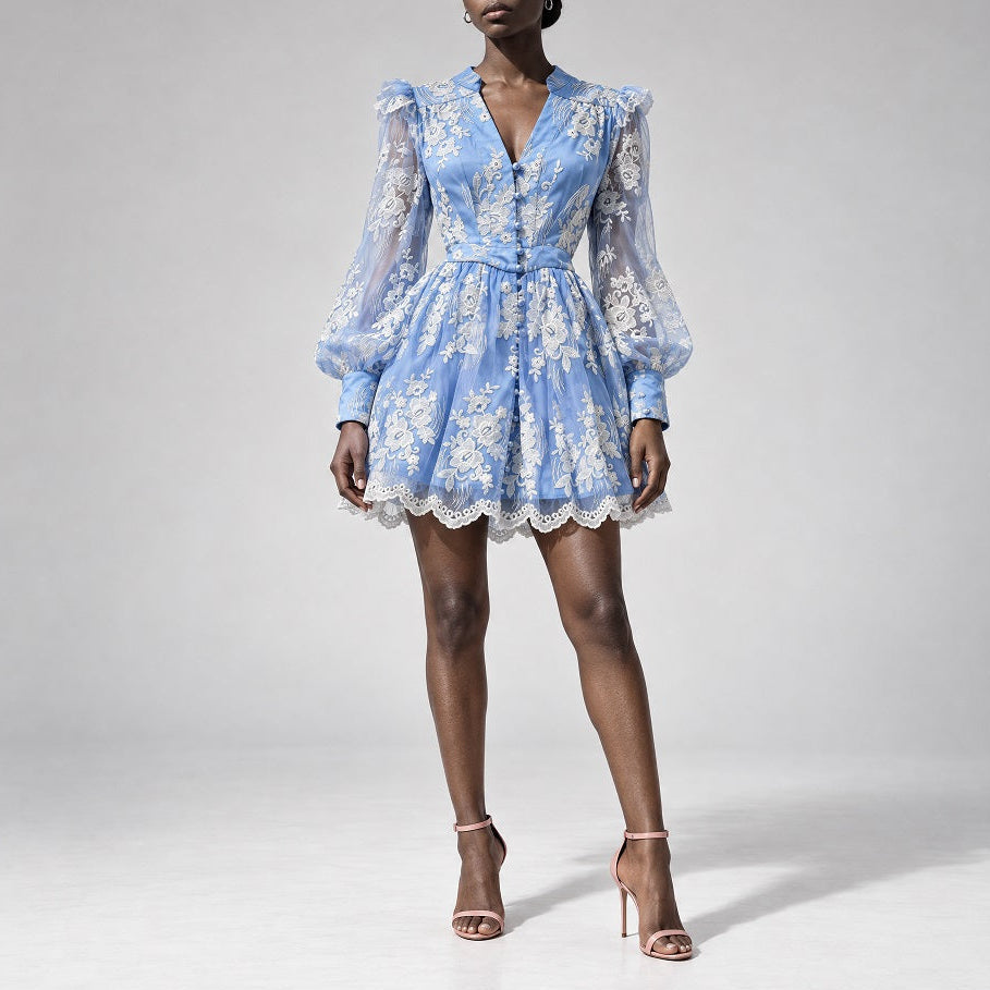 Blush pink floral embroidered organza lace mini dress with puff sleeves and scalloped hem Detail of sheer floral embroidered lantern sleeve and scalloped lace hem on pink mini dress
