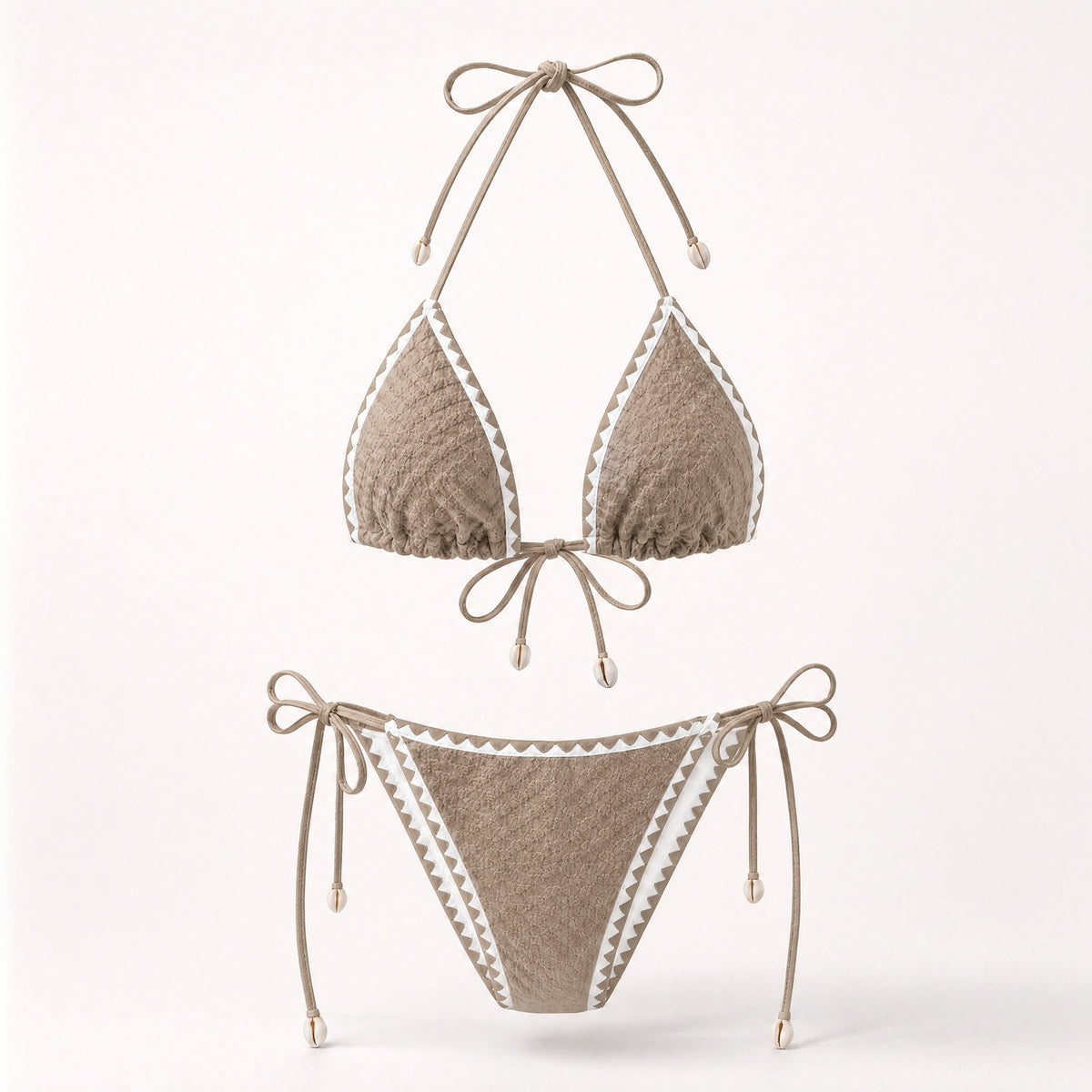 Earthy mocha tan boho bikini with shell details and white trim.