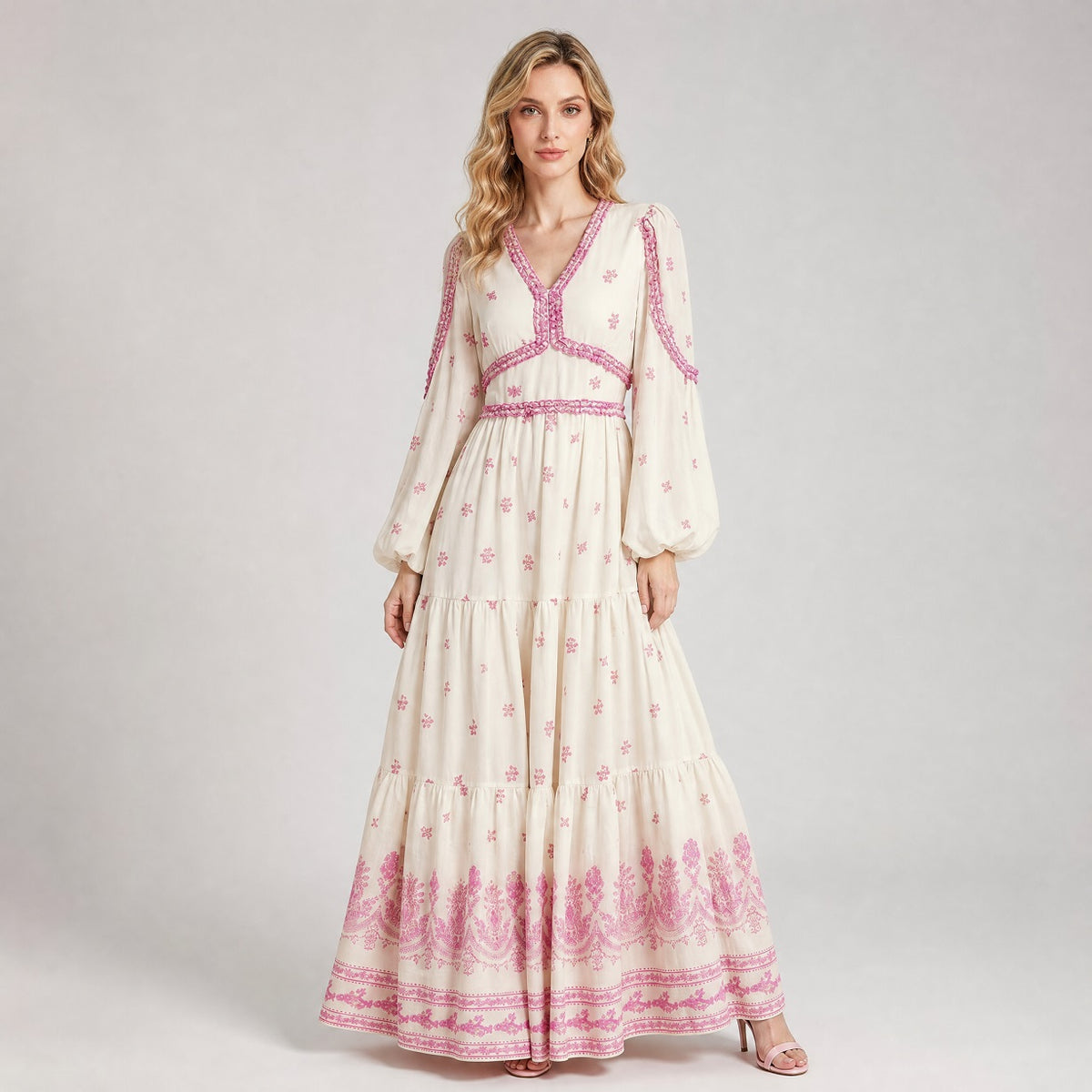 Stefanie Maxi Dress in cream with pink floral embroidery, featuring balloon sleeves and a tiered skirt.