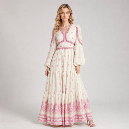 Stefanie Maxi Dress in cream with pink floral embroidery, featuring balloon sleeves and a tiered skirt.