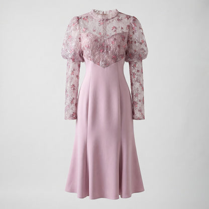 Front view of the Stella mauve mini dress featuring purple floral lace embroidery, puff sleeves, and a flared mermaid skirt.