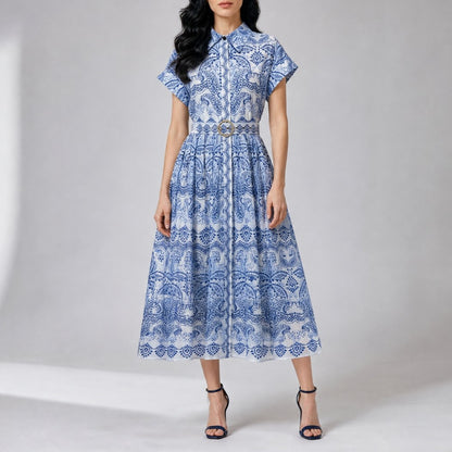 Tami paisley print midi shirt dress with short sleeves and matching belt available in blue and rust colors.