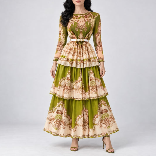women's green and beige floral pleated tiered long-sleeve maxi dress; texture and vintage print; long-sleeved maxi dress with a tiered ruffle skirt. The dress features an olive green base with a beige and brown baroque-style floral pattern.
