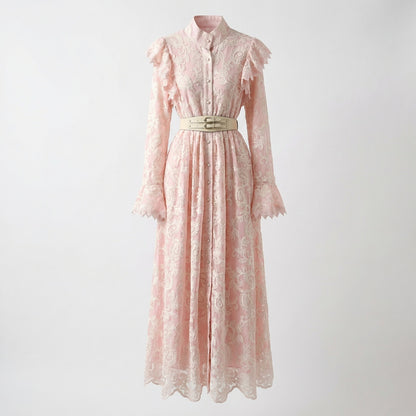 Xolile floral embroidered lace maxi dress with ruffled shoulders and white double-buckle belt, shown in pink, blue, and black.