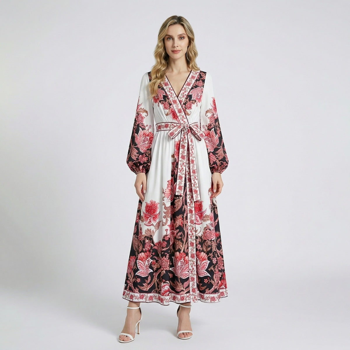 Full-length Yara floral maxi dress in black and white with balloon sleeves and waist tie, 130cm long.