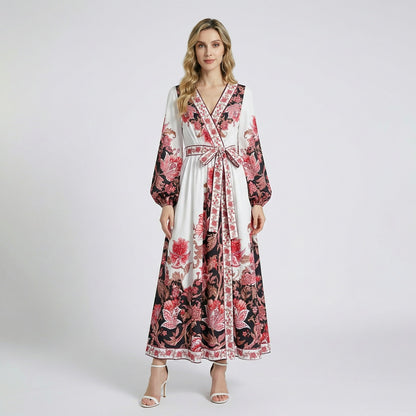 Full-length Yara floral maxi dress in black and white with balloon sleeves and waist tie, 130cm long.